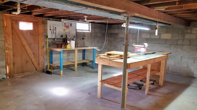 a room with table chair and wooden floor