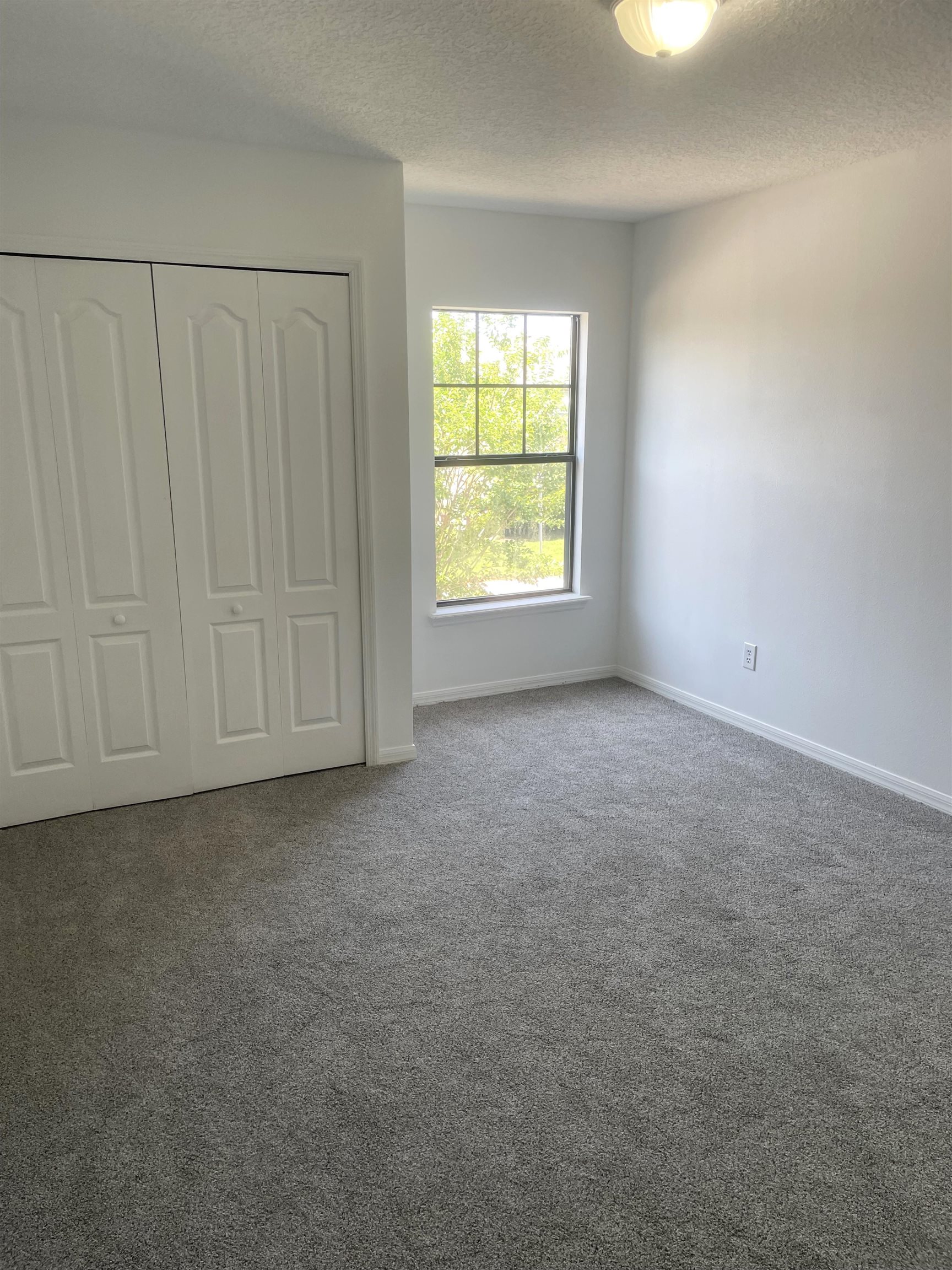 509 Cabernet Place St. Augustine, FL 32084 - Photo 13 of 16 an empty room with a window