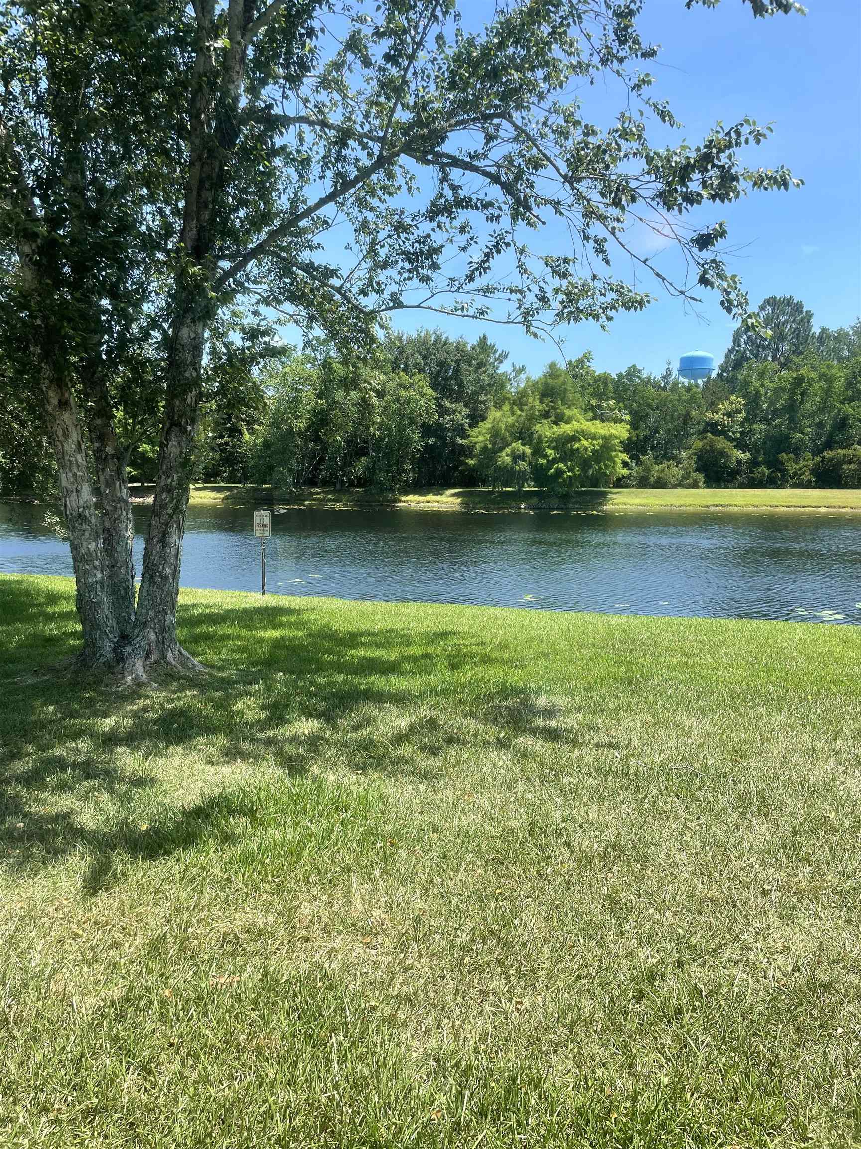 509 Cabernet Place St. Augustine, FL 32084 - Photo 6 of 16 a view of a lake from a yard