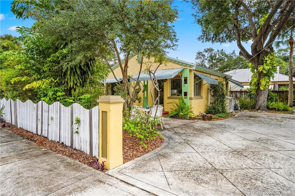120 Southwest 5th Street Stuart, FL 34994 - Photo 26 of 35 a front view of a house with a tree