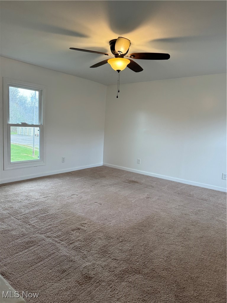 5155 Center Road Philo, OH 43771 - Photo 25 of 37 Spare room with carpet flooring and ceiling fan