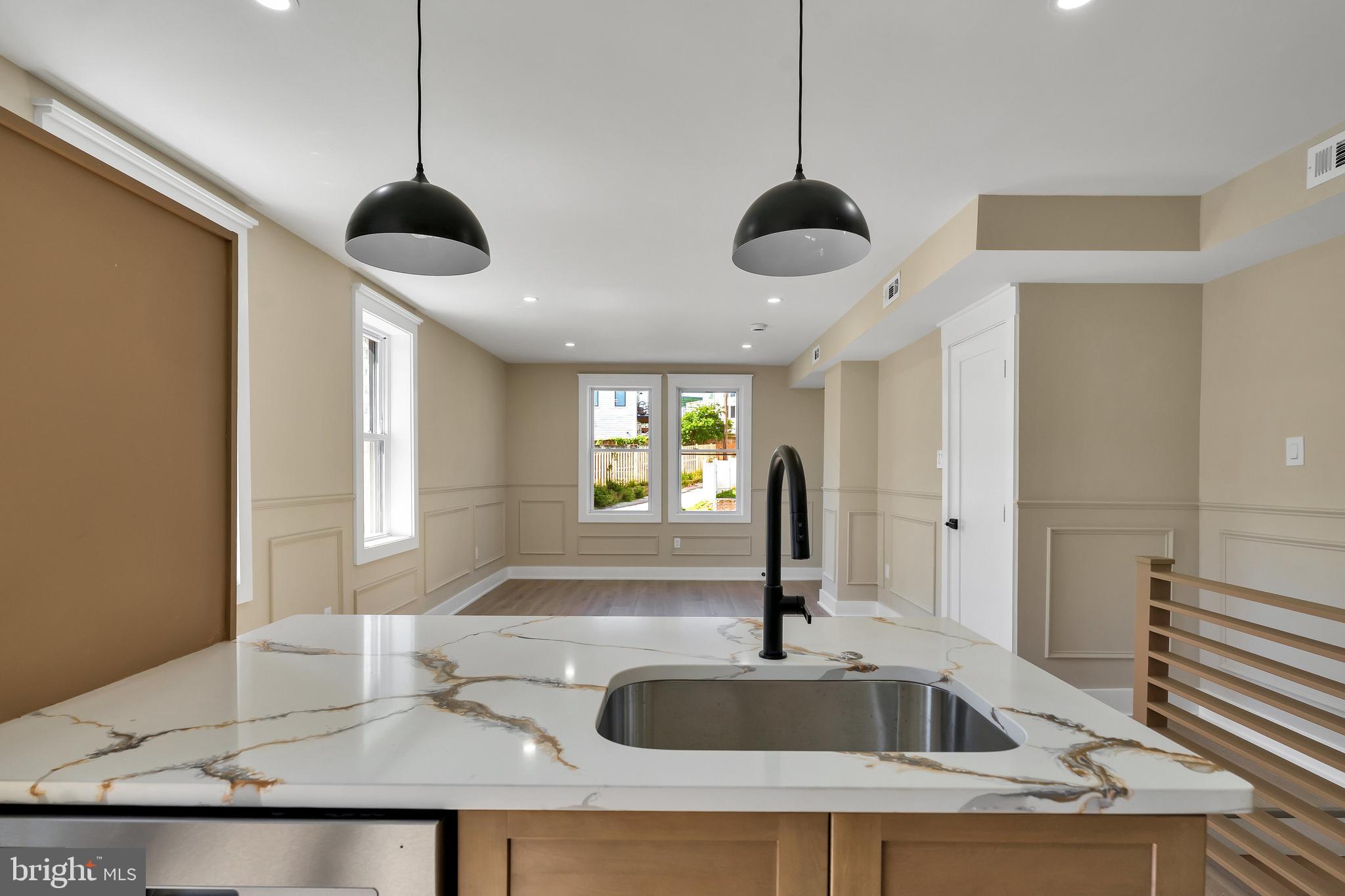 1274 Meigs Place Northeast Washington, DC 20002 - Photo 11 of 57 a kitchen with a counter space a sink and a window