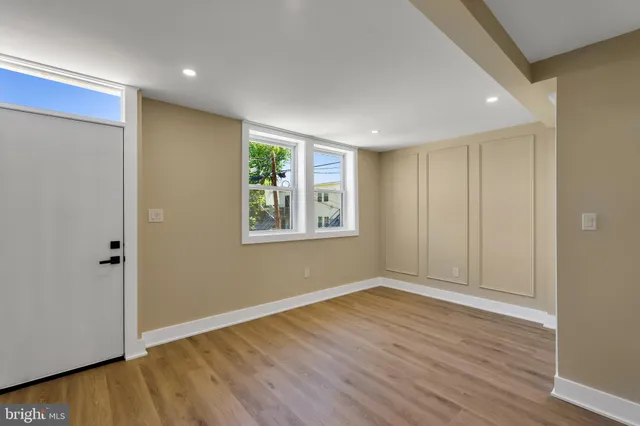 a en suite bathroom with a sink and mirror