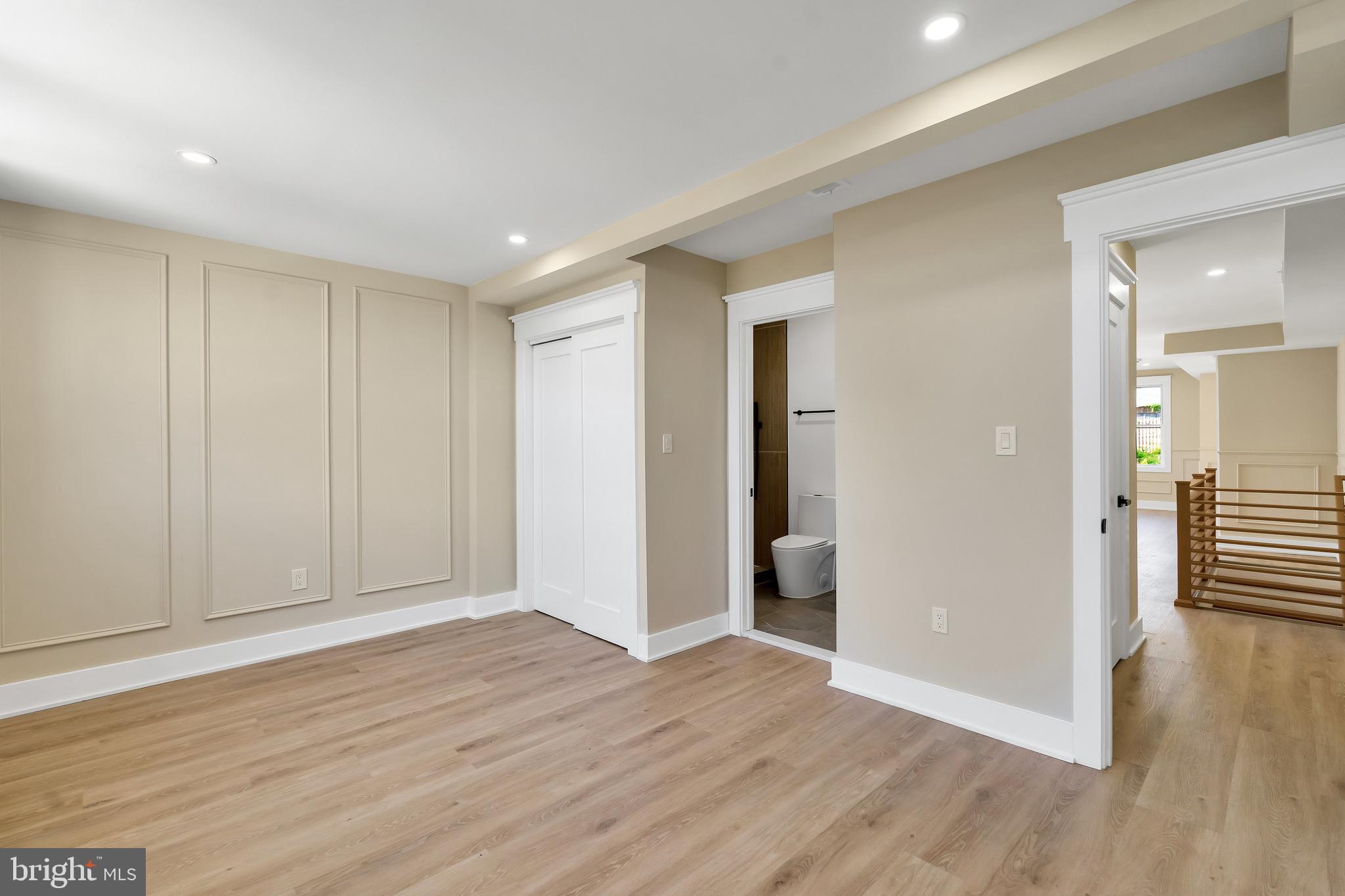 1274 Meigs Place Northeast Washington, DC 20002 - Photo 16 of 57 a view of a hallway with wooden floor