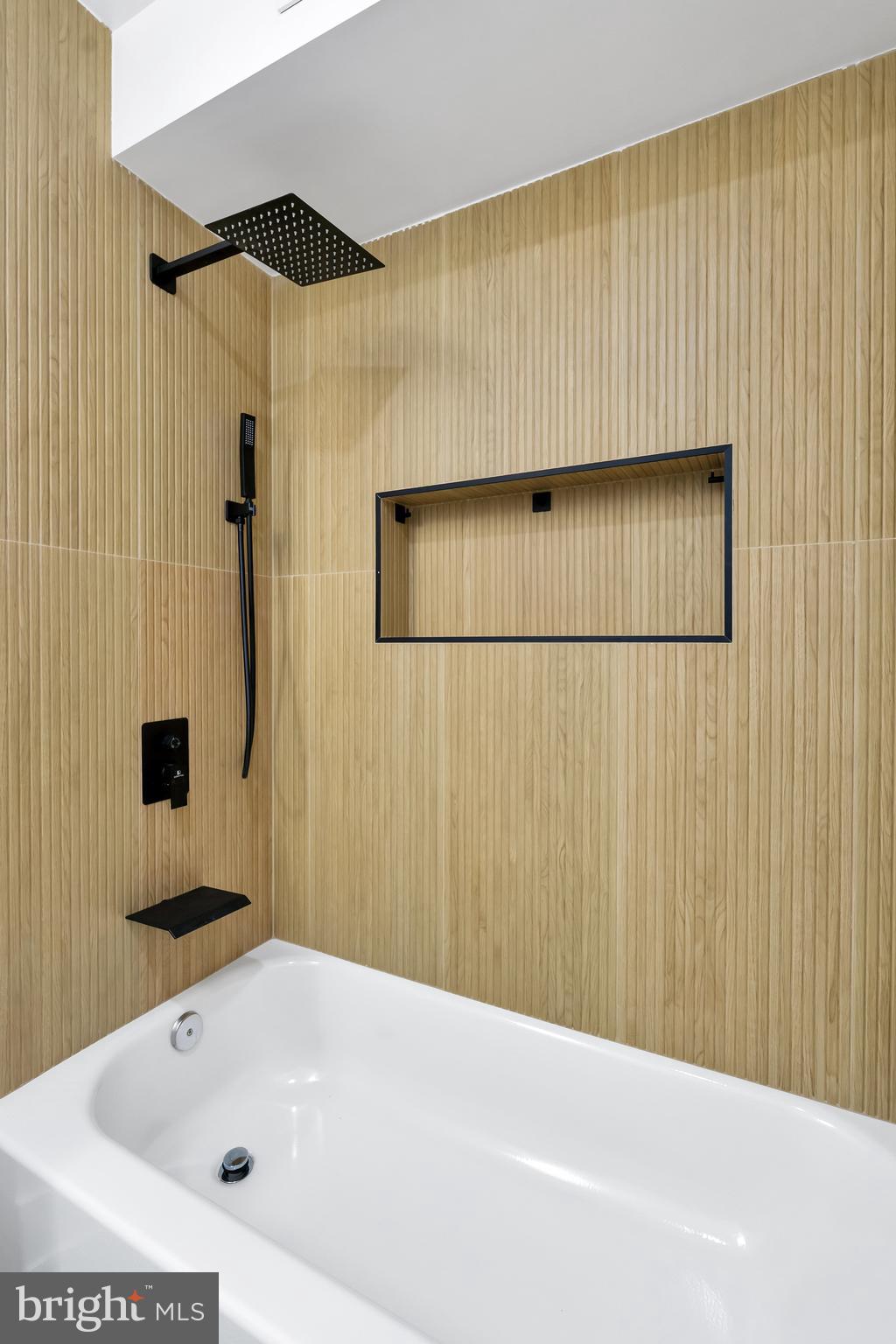 1274 Meigs Place Northeast Washington, DC 20002 - Photo 29 of 57 a bathroom with a bathtub and shower