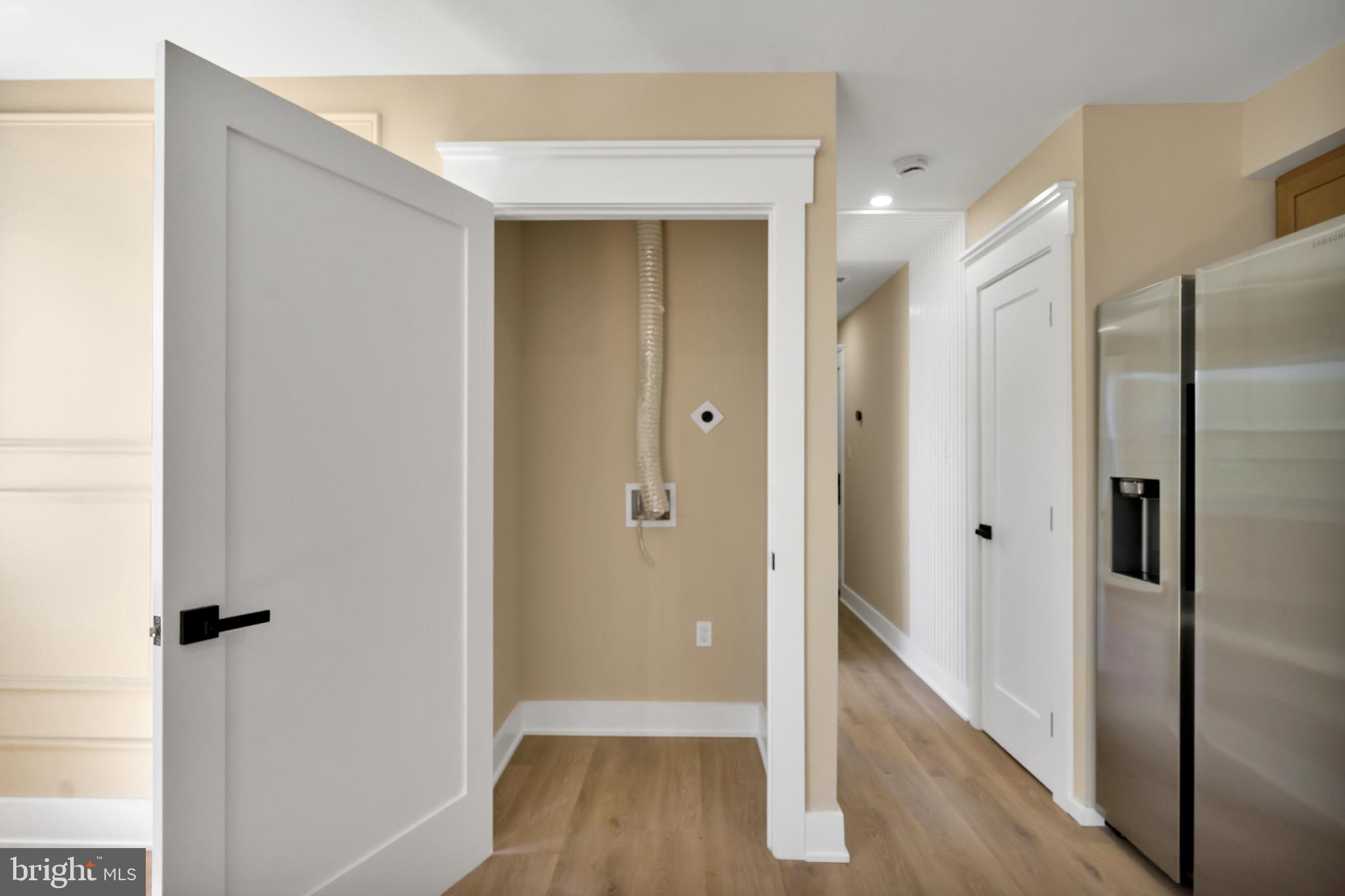1274 Meigs Place Northeast Washington, DC 20002 - Photo 54 of 57 a view of a hallway with wooden floor