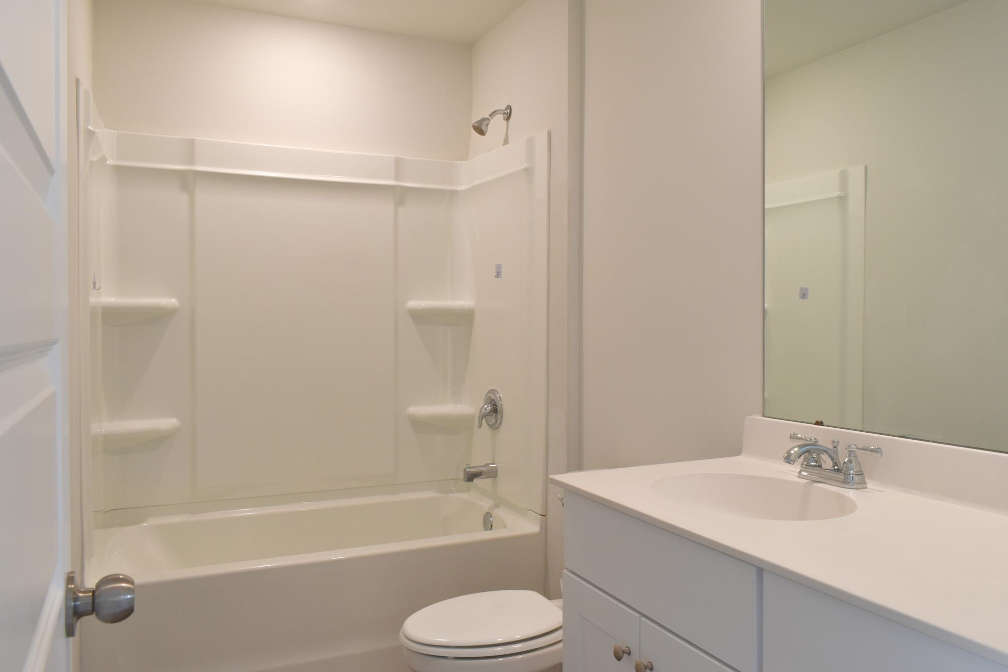1057 Saltgrass Way Myrtle Beach, SC 29588 - Photo 13 of 23 Bathroom with vanity and shower / washtub combination