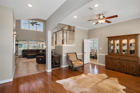 a bedroom with furniture and a window