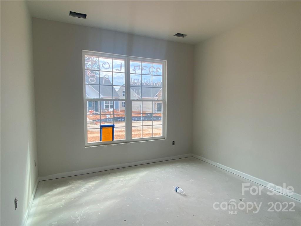 3237 Windhaven Lane, Unit 98 Tega Cay, SC 29708 - Photo 14 of 17 an empty room with a window