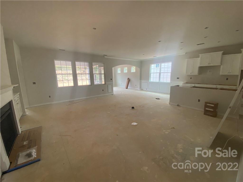 3237 Windhaven Lane, Unit 98 Tega Cay, SC 29708 - Photo 3 of 17 a view of an empty room with a window