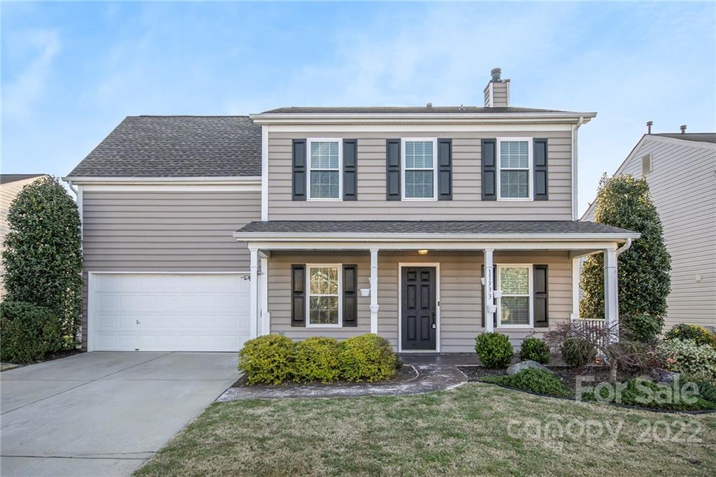 11333 Chapeclane Road Charlotte, NC 28278 - Photo 1 of 23 a front view of a house with garden
