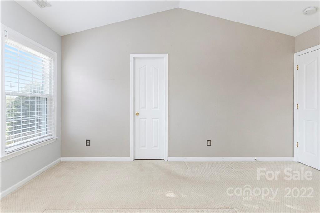 11333 Chapeclane Road Charlotte, NC 28278 - Photo 14 of 23 a view of an empty room with a window
