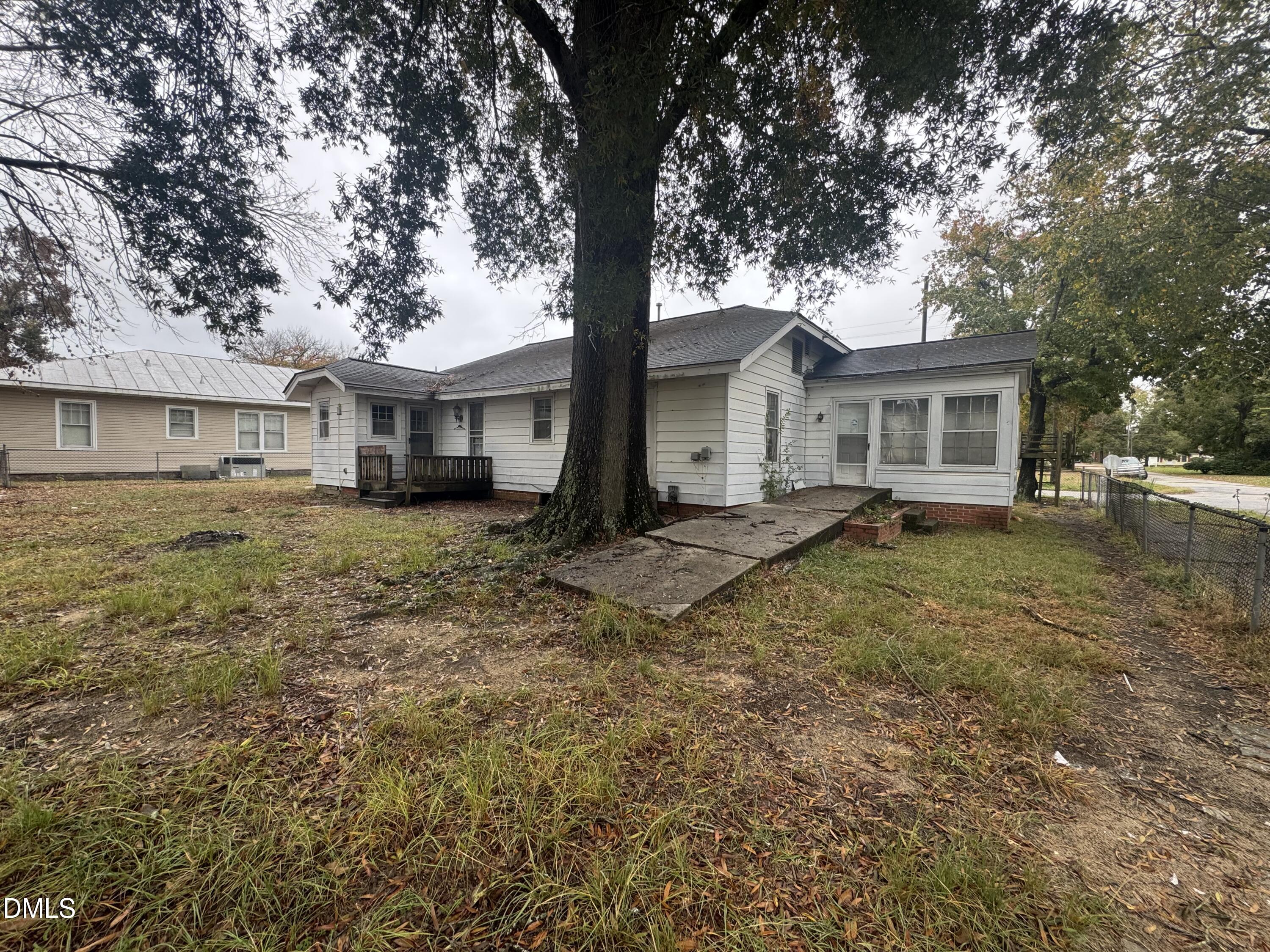 212 South 6th Street Smithfield, NC 27577 - Photo 17 of 17 front view of a house with a yard