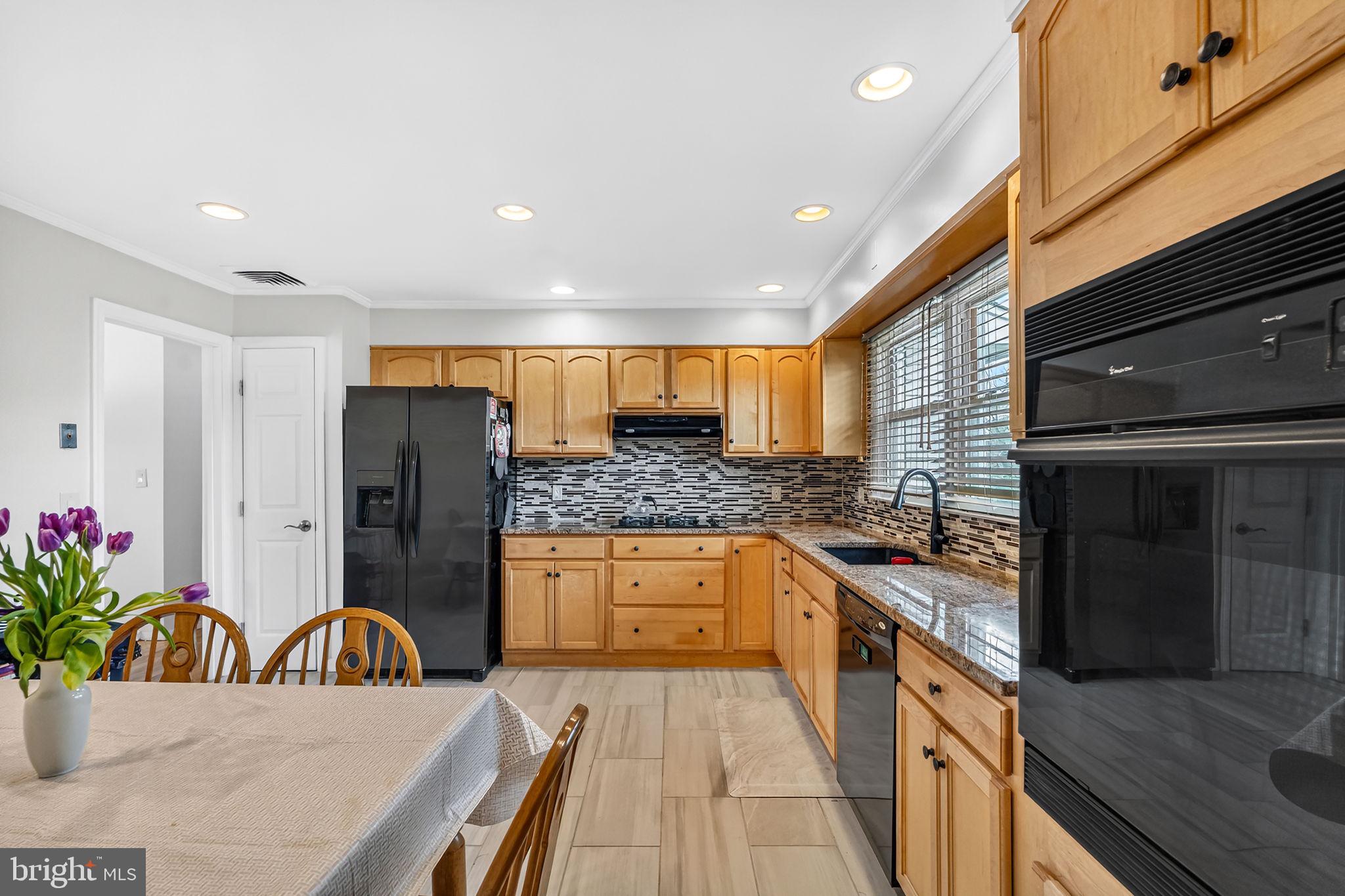 1305 Carlisle Road North Brunswick, NJ 08902 - Photo 7 of 32 Eat-in kitchen with modern finishes.