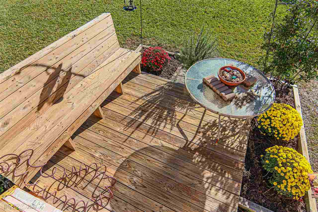 952 Woodruff Road Selma, NC 27576 - Photo 27 of 30 Back Deck Seating area