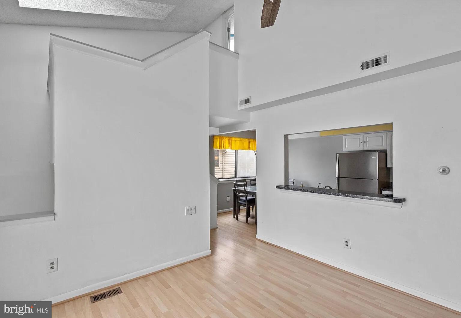 1212 Roberts Way Voorhees, NJ 08043 - Photo 13 of 29 a view of empty room with wooden floor and fan