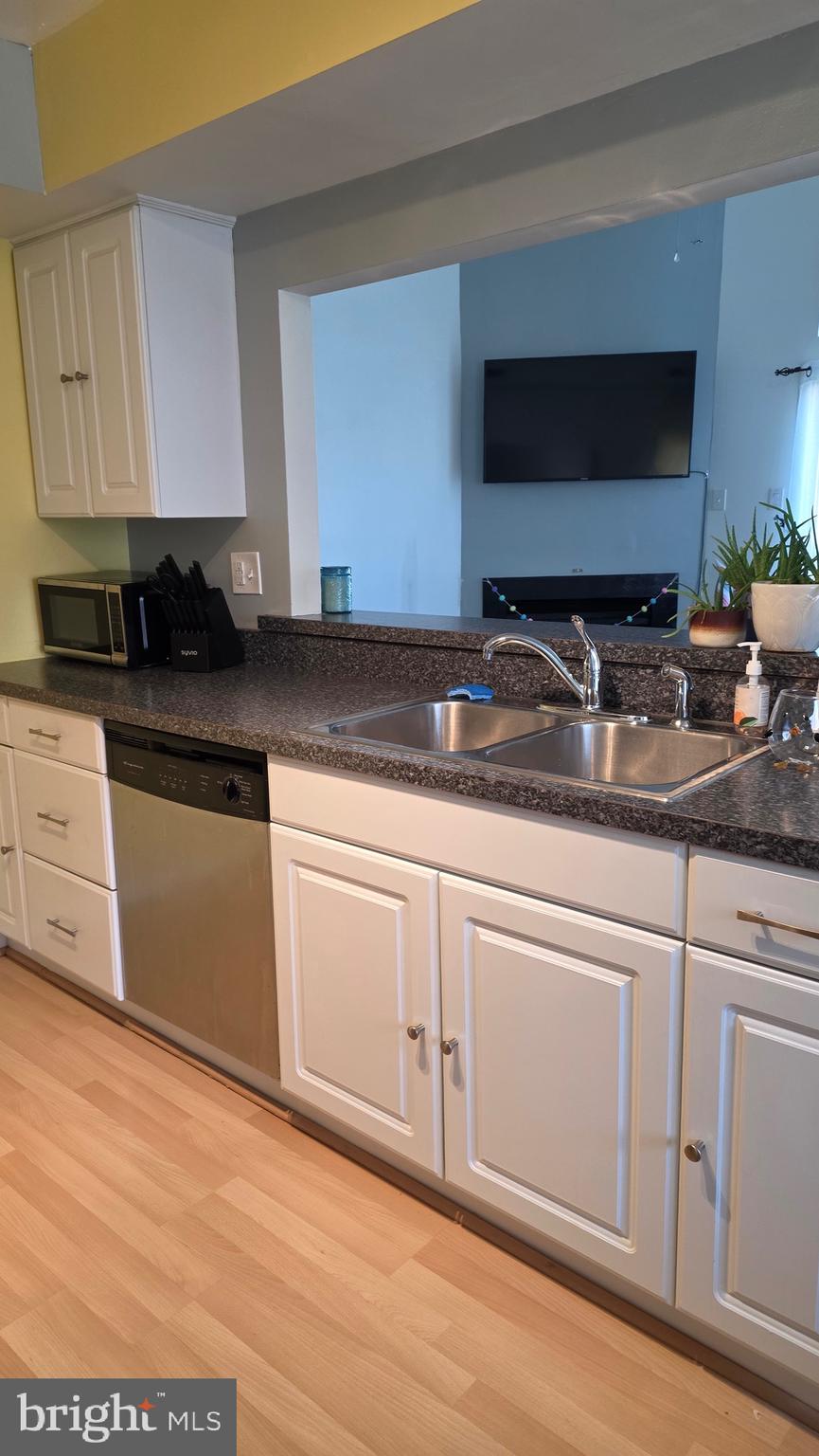 1212 Roberts Way Voorhees, NJ 08043 - Photo 2 of 29 a kitchen with granite countertop white cabinets and a sink