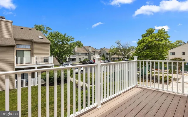 a view of a door and a window