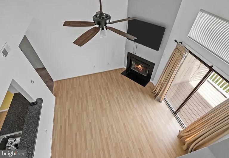 1212 Roberts Way Voorhees, NJ 08043 - Photo 7 of 29 a living room with a fireplace furniture a flat screen tv and a window