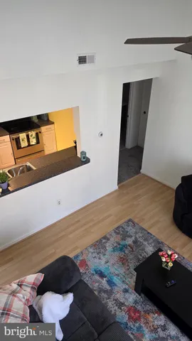 a bedroom with a bed and a mirror