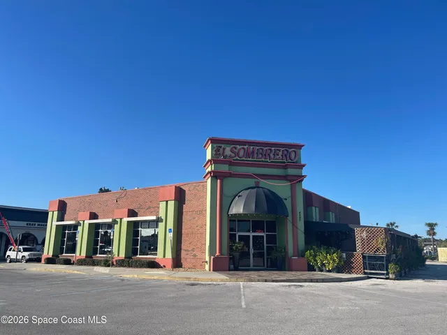 a view of a building with a street