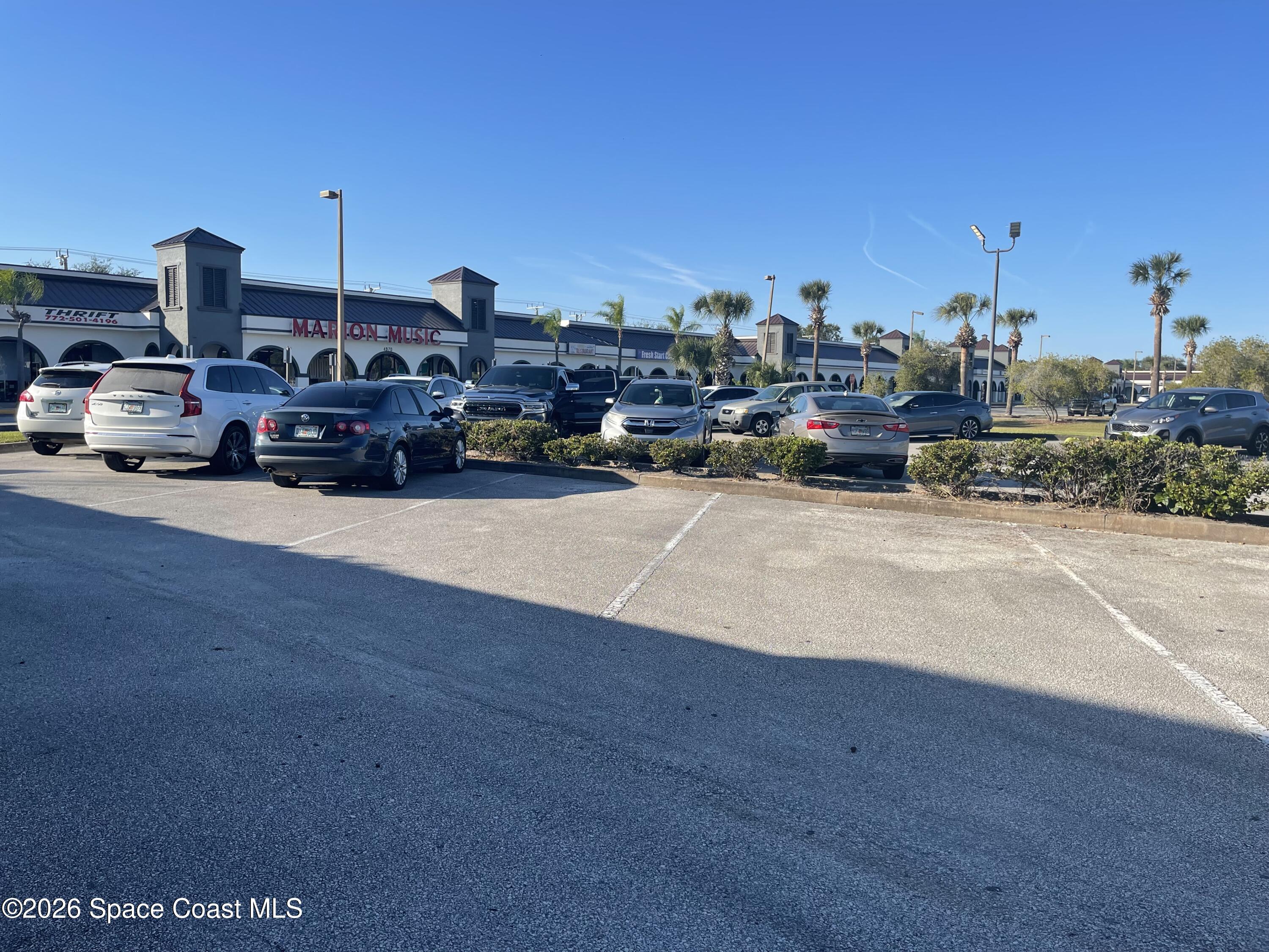 4990 Stack Boulevard Melbourne, FL 32905 - Photo 9 of 11 a view of a parking space
