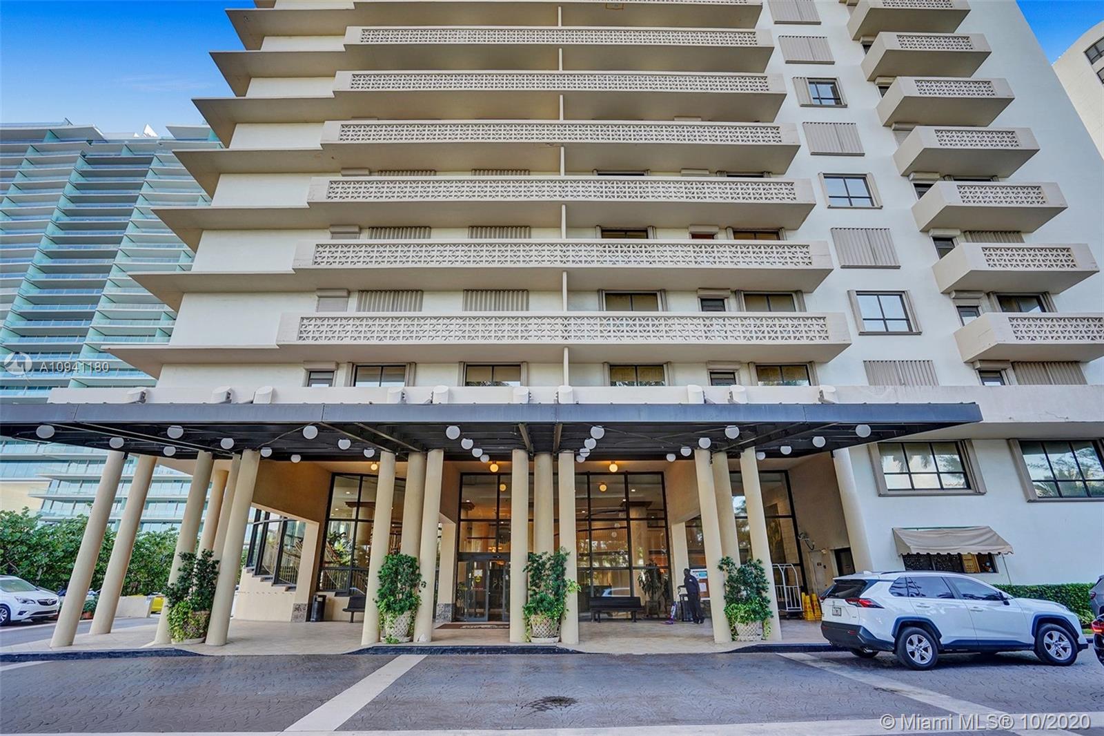 10185 Collins Avenue, Unit 818 Bal Harbour, FL 33154 - Photo 17 of 41 a car parked in front of a building