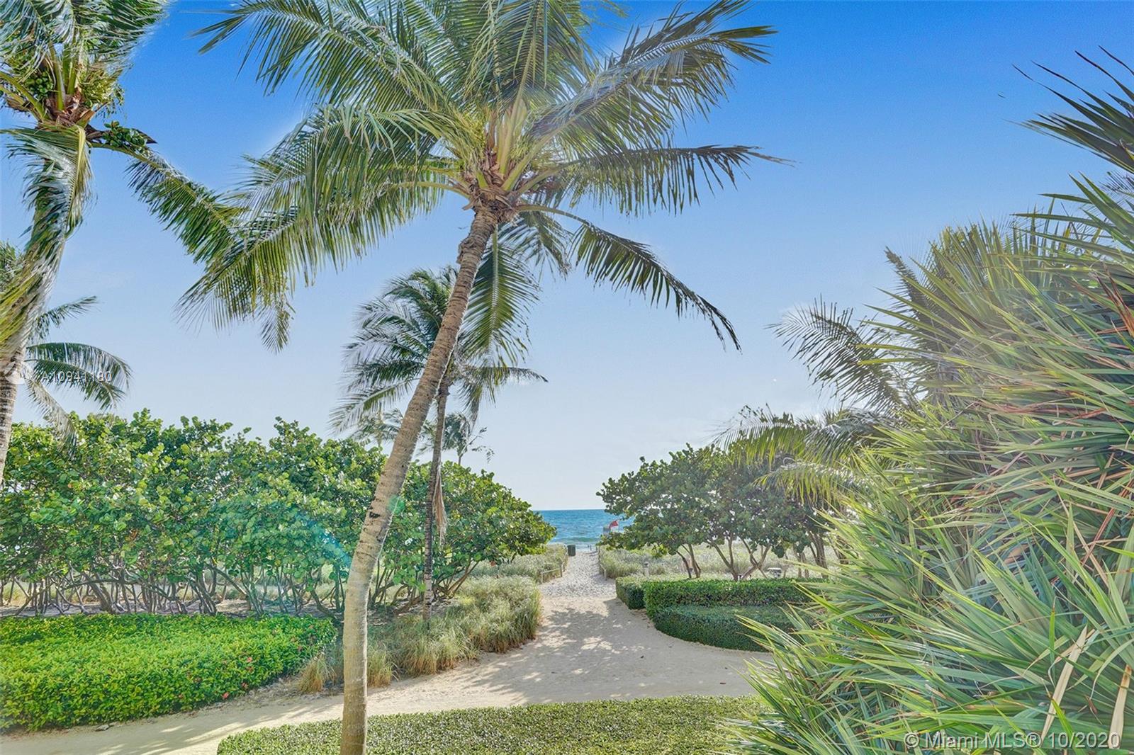 10185 Collins Avenue, Unit 818 Bal Harbour, FL 33154 - Photo 21 of 41 a view of a yard