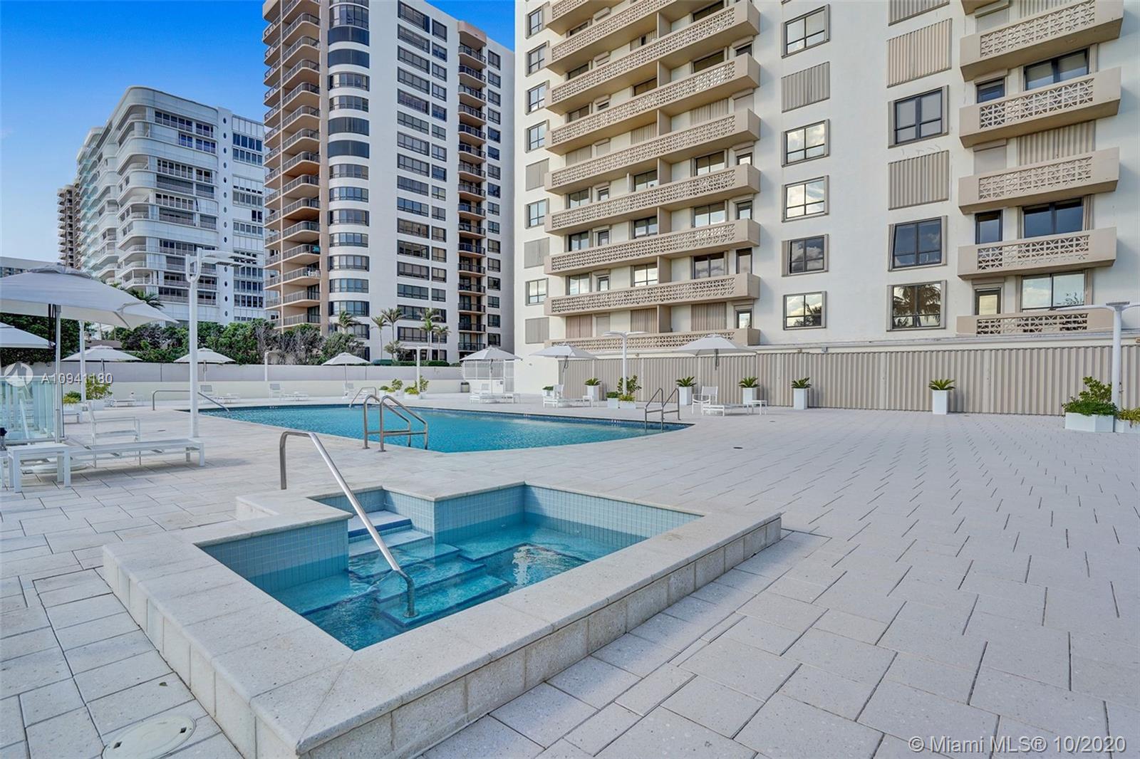 10185 Collins Avenue, Unit 818 Bal Harbour, FL 33154 - Photo 22 of 41 a swimming pool view with a outdoor seating