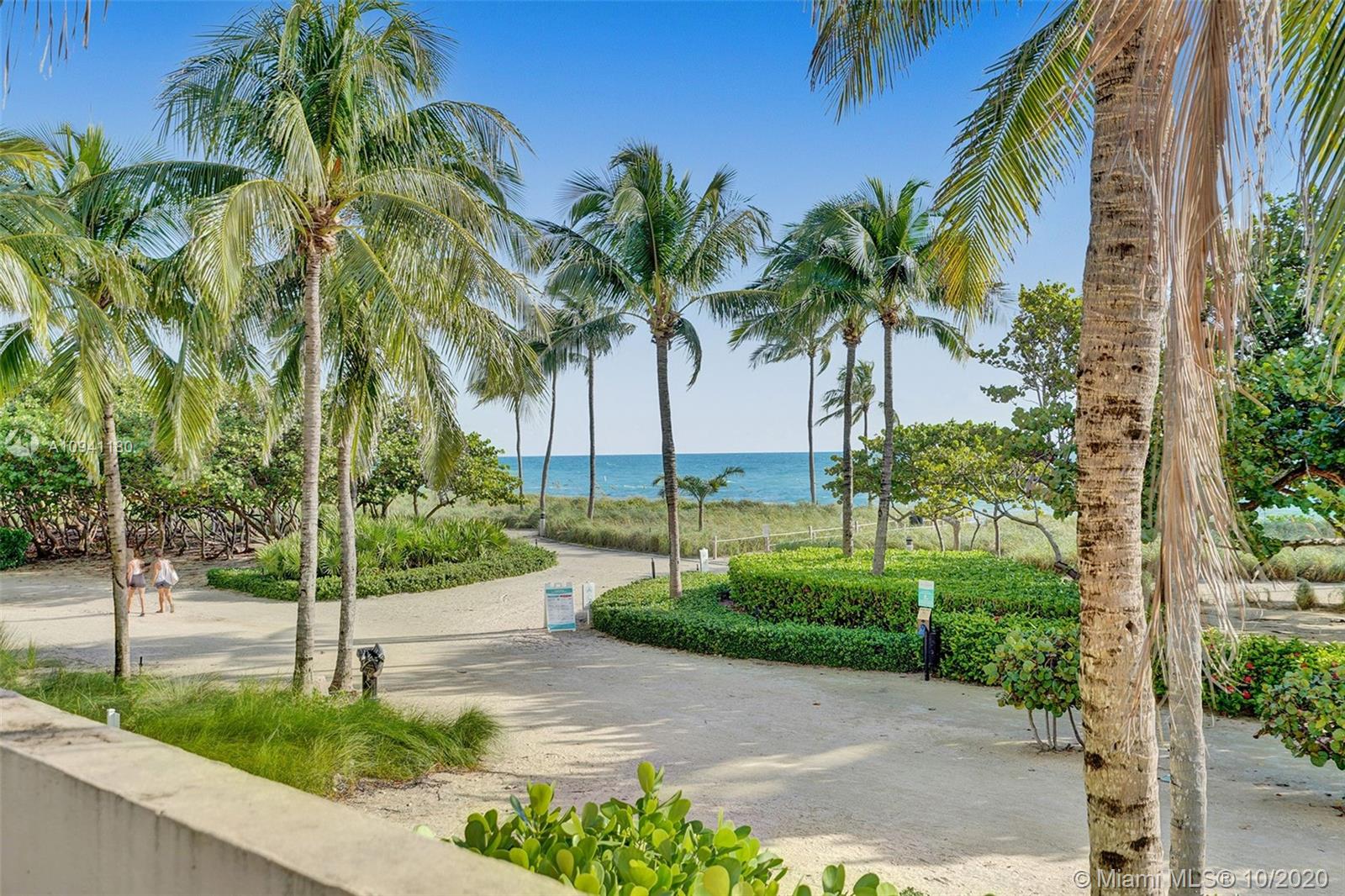10185 Collins Avenue, Unit 818 Bal Harbour, FL 33154 - Photo 24 of 41 a view of a street with a palm tree