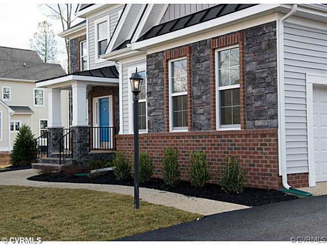 26 Miners Trail Road Midlothian, VA 23114 - Photo 2 of 24 a front view of a house with a yard