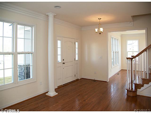 26 Miners Trail Road Midlothian, VA 23114 - Photo 3 of 24 wooden floor in an empty room with a window