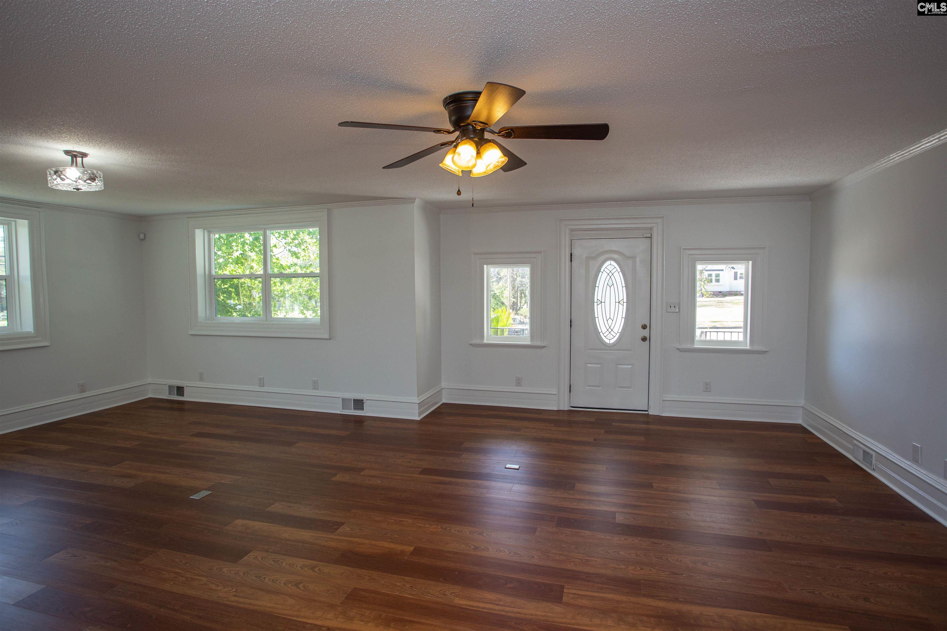 1700 Broad Street Camden, SC 29020 - Photo 6 of 41 a view of an empty room with wooden floor and a window