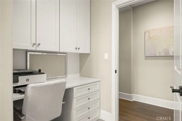 a bathroom with double vanity sinks and a mirror