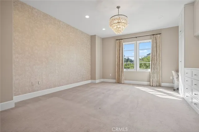 a bathroom with a granite countertop sink a shower and a mirror
