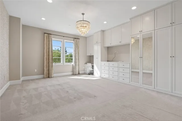 a view of an entryway with hallway