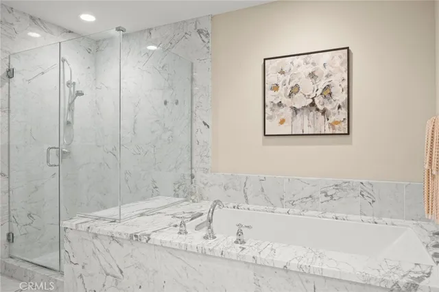 a view of a room that has a large window and front view