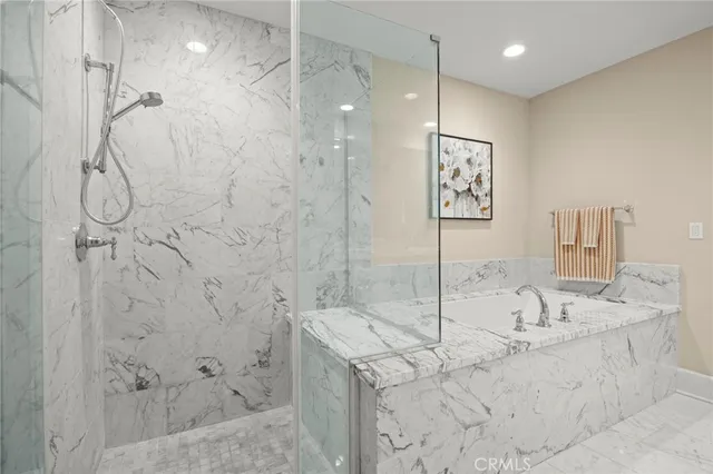 a utility room with sink dryer and washer