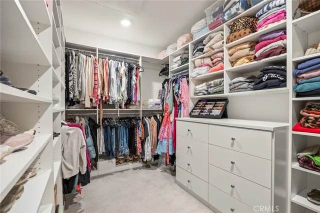 a row of palm trees sitting in front of building