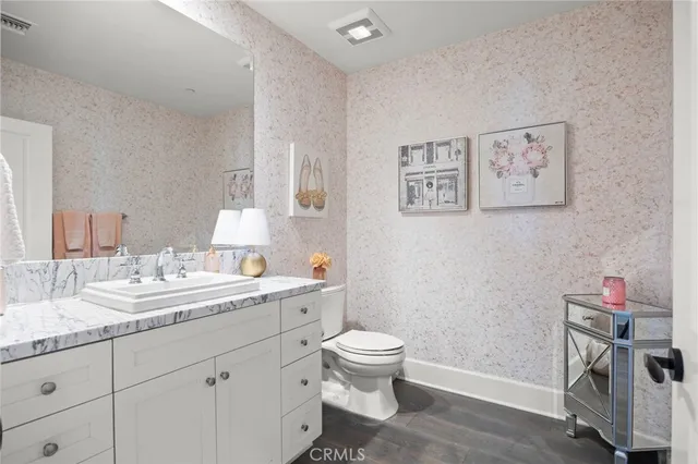 a stove top oven sitting inside of a kitchen