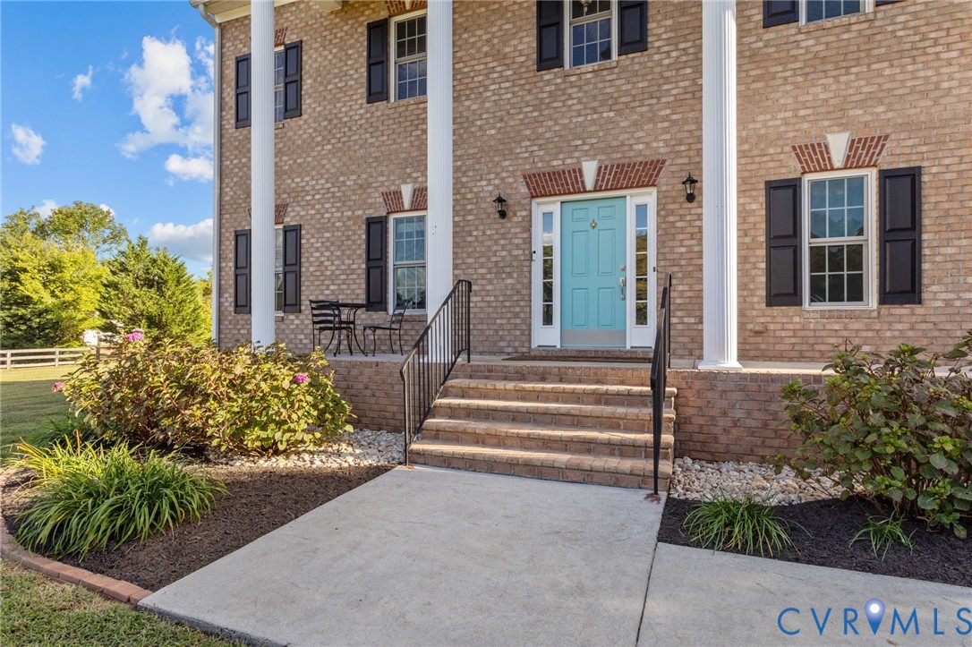 16431 River Road Chesterfield, VA 23838 - Photo 2 of 36 Brick exterior with a vibrant turquoise entry door