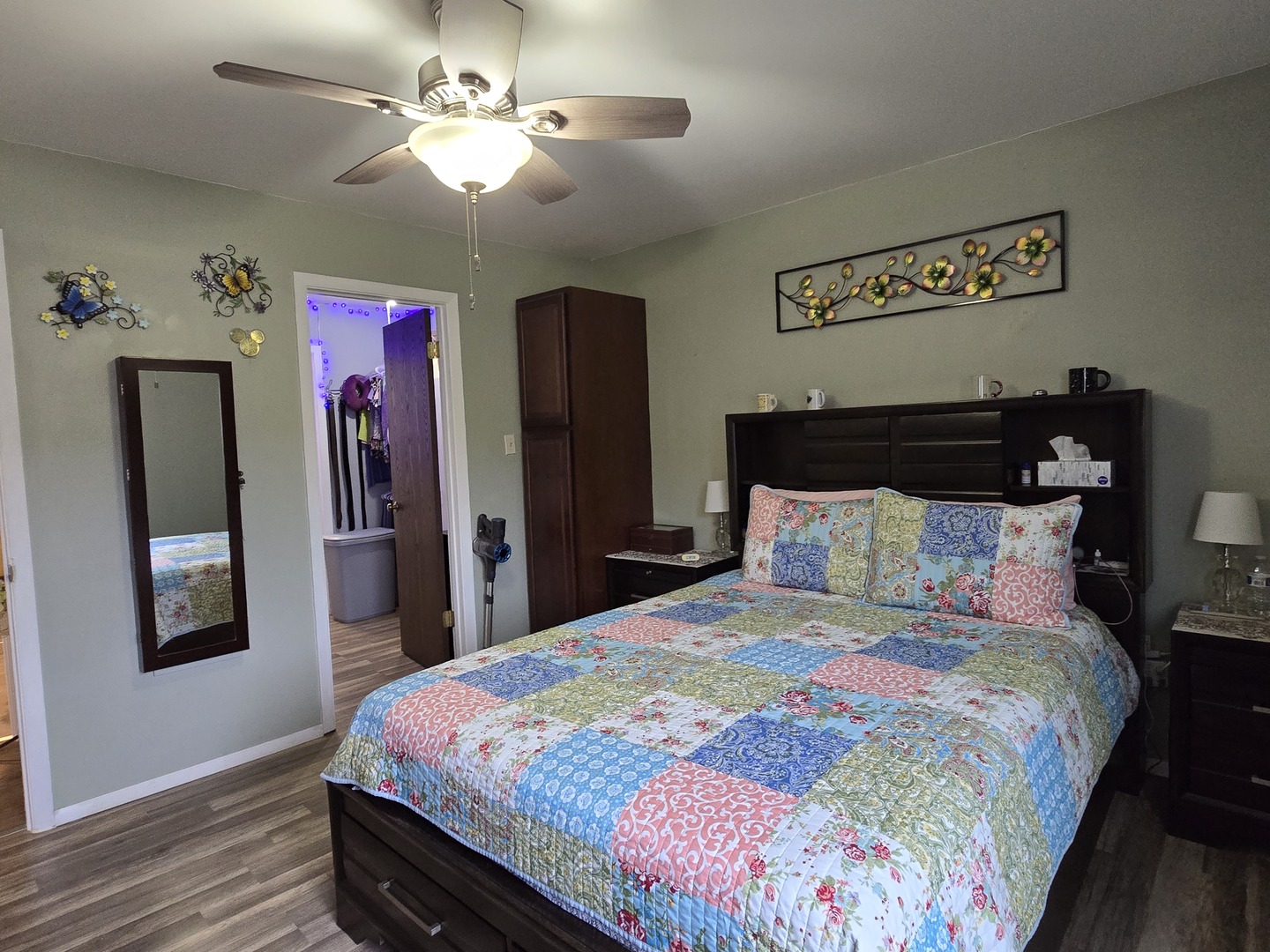 161 West Elk Trail, Unit 263 Carol Stream, IL 60188 - Photo 8 of 14 a bedroom with a bed and a chandelier