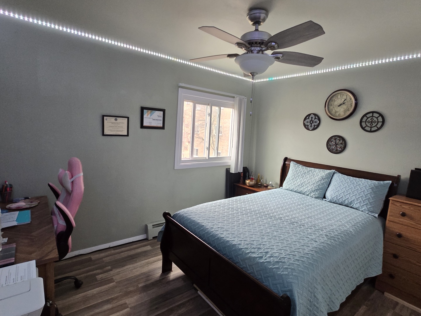 161 West Elk Trail, Unit 263 Carol Stream, IL 60188 - Photo 9 of 14 a bedroom with a bed and a chandelier