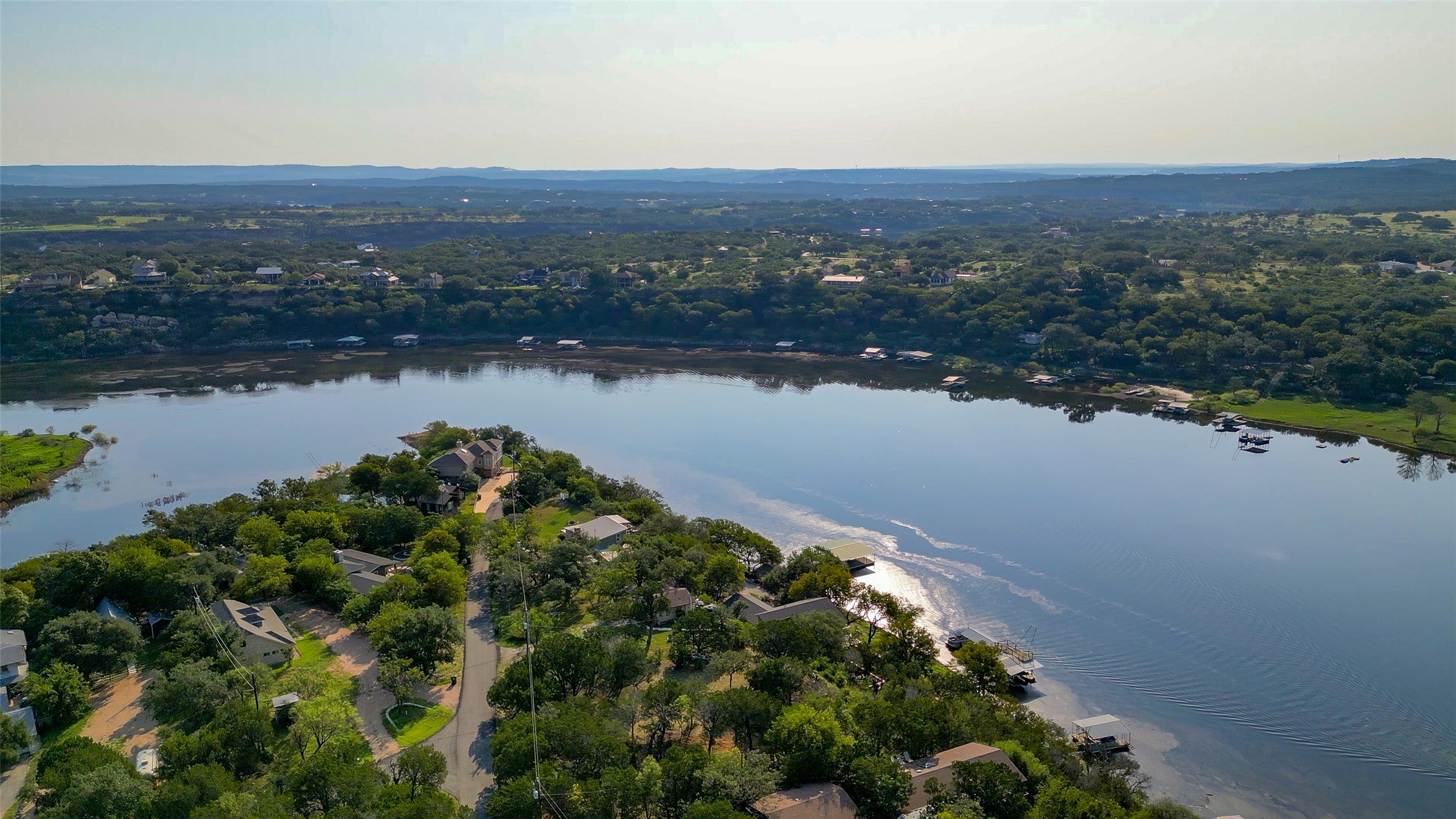 3 acres with a level build site and dock!