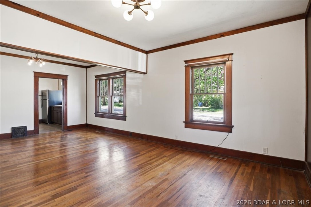 301 South Locust Street Eldon, MO 65026 - Photo 14 of 35 Another look at those gorgeous floors in the famil
