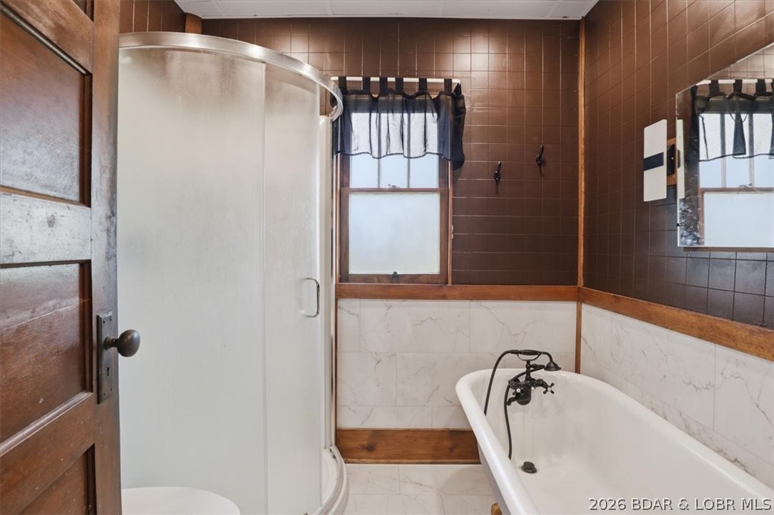 301 South Locust Street Eldon, MO 65026 - Photo 25 of 35 Full bath with walk in shower and large soaker tub