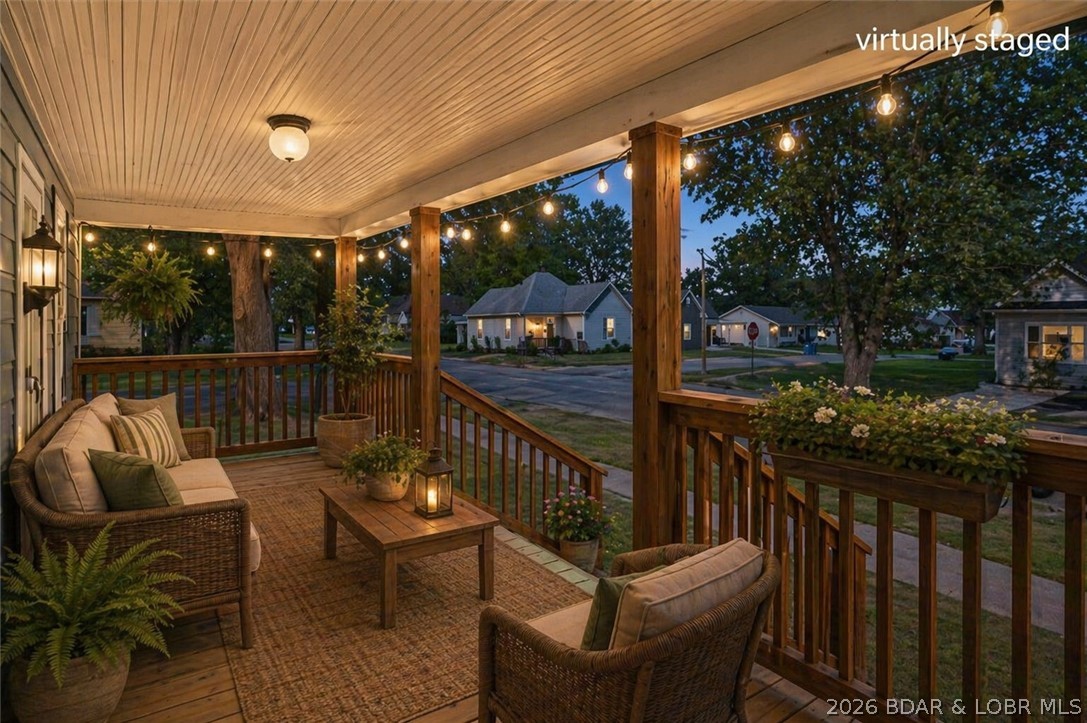301 South Locust Street Eldon, MO 65026 - Photo 35 of 35 Virtually staged front porch..