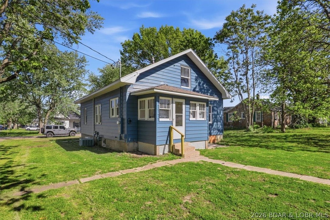301 South Locust Street Eldon, MO 65026 - Photo 5 of 35 Rear view of the house...mudroom at the back entra