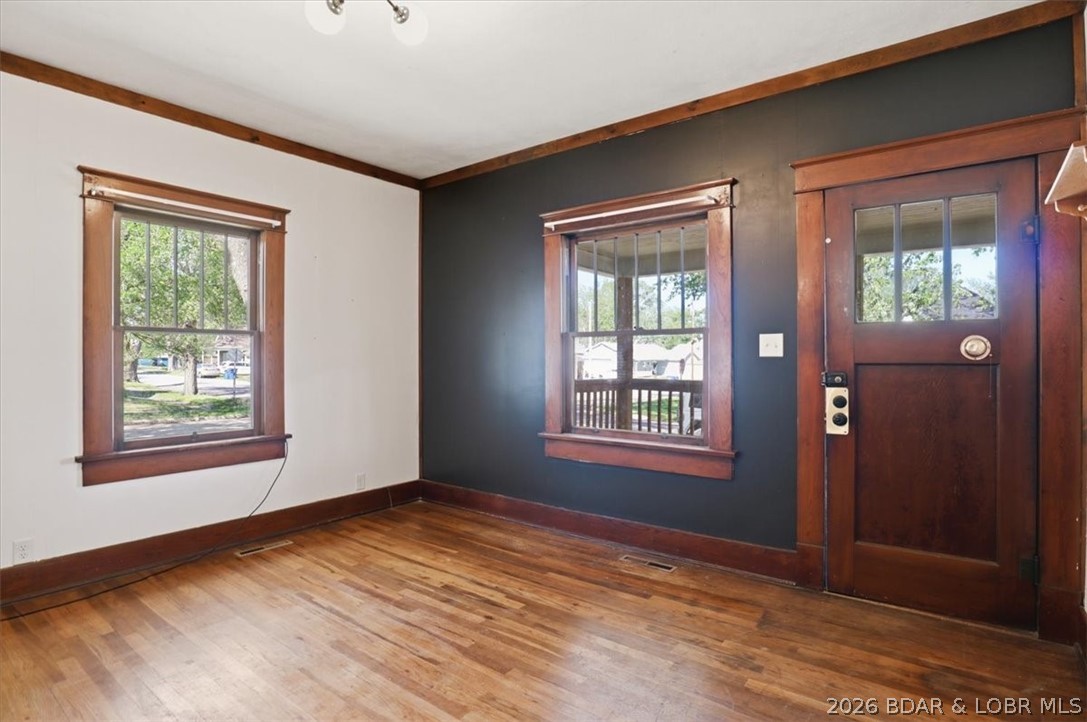 301 South Locust Street Eldon, MO 65026 - Photo 8 of 35 Gorgeous original hardwood floors, doors and trim
