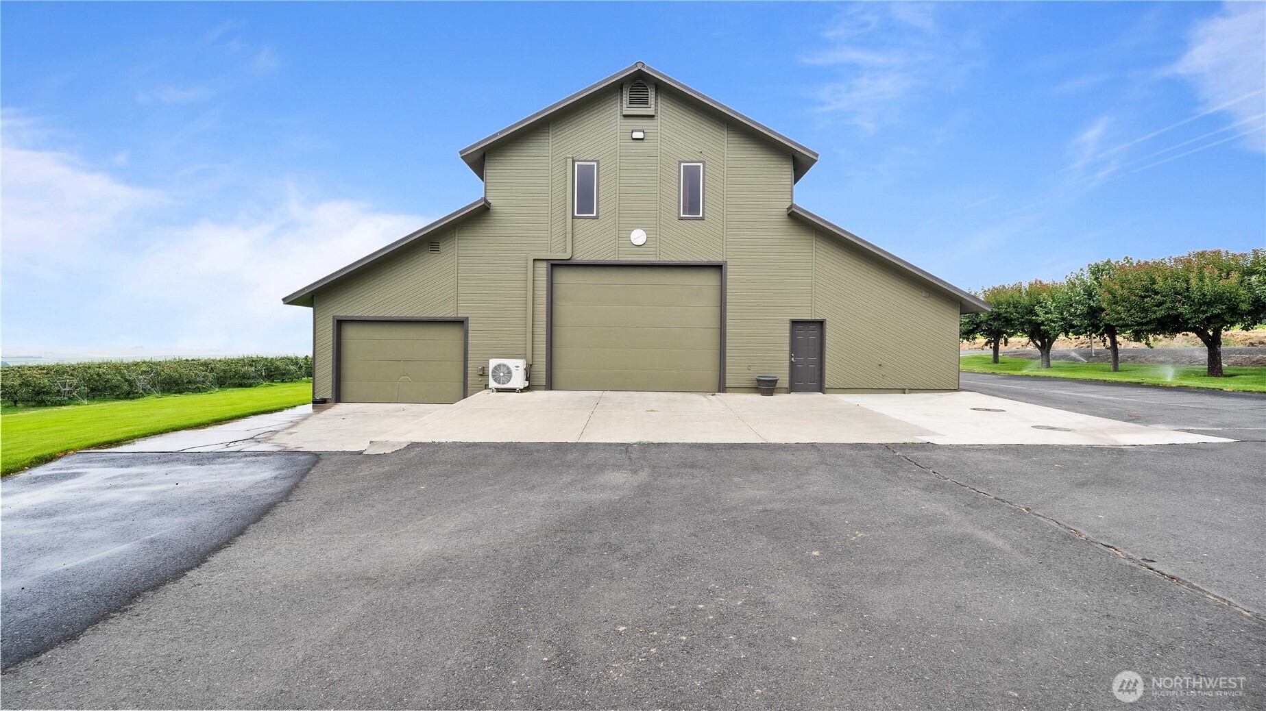 31 Rangeview Road Othello, WA 99344 - Photo 23 of 40 a view of the house with a yard and garage